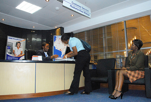 IBM technology is helping to transform banking in Tanzania (Customer Service desk at NMB Dar es Salaam).