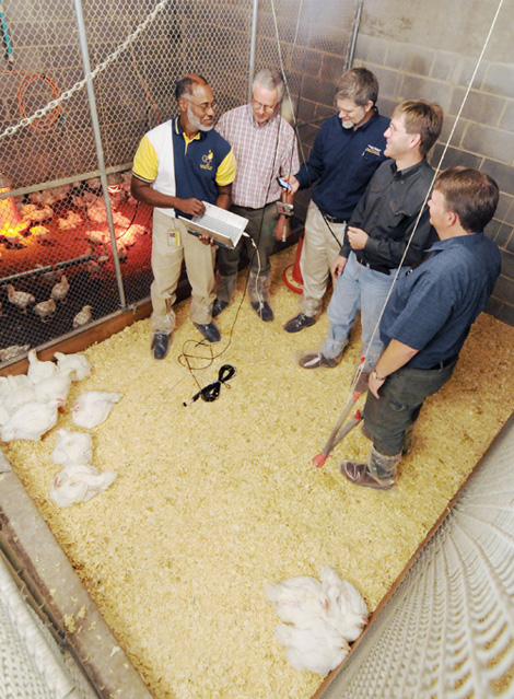 wGa Tech and UGA examine recordings of bird vocalizations from a small flock of chickens at the University of Georgia’s Poultry Research Center. Shown are (l-r) Wayne Daley, Bruce Webster, Doug Britton, David Anderson and Casey Ritz.