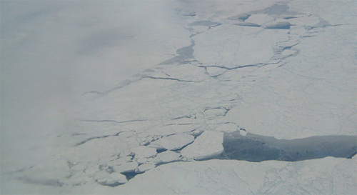 A new airborne study with NASA contributions measured surprising levels of the potent greenhouse gas methane coming from cracks in Arctic sea ice and areas of partial sea ice cover. This image was taken over the Arctic Ocean at a latitude of approximately 71 degrees North on April 15, 2010.