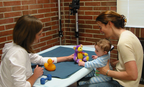 A 1 year old baby participates in a language test at UW’s Institute for Learning & Brain Sciences. Image credit: University of Washington