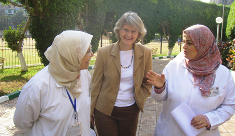 Elizabeth Bradley (center) meets with health care workers in Egypt. Image credit: Yale University