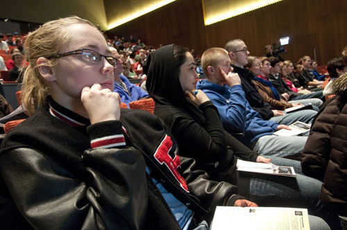 The University invited science teachers from several Chicago area high schools to attend three full-day workshops at Argonne, Fermilab and the University of Illinois to help them prepare their students for the culminating panel presentation at the Reva and David Logan Center for the Arts. Busloads of students and educators from Lockport Township, Oak Lawn Community High School, Pritzker College Prep and Rossville High School came to the Higgs boson event. Photo by Lloyd DeGrane