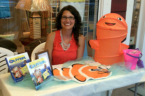 Stephanie Guzman, a UD alumna, is writing a series of children's books called "The Adventures of Oliver the Clownfish" to help children deal with typical challenges in their lives. Image credit: University of Delaware