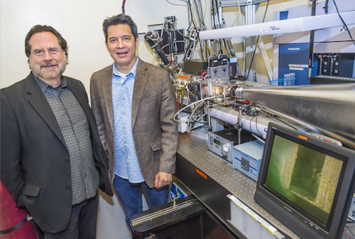 John Tainer (left) and Rob Rambo at the SIBYLS beamline of the Advanced Light Source have developed new metrics that dramatically improves data analysis for small angle scattering (SAS) experiments. (Photo by Roy Kaltschmidt, Berkeley Lab)