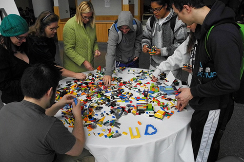 UD students enjoy Lego play in conjunction with David Robertson's lecture. Photos by Ambre Alexander and courtesy of Blue Hen Says