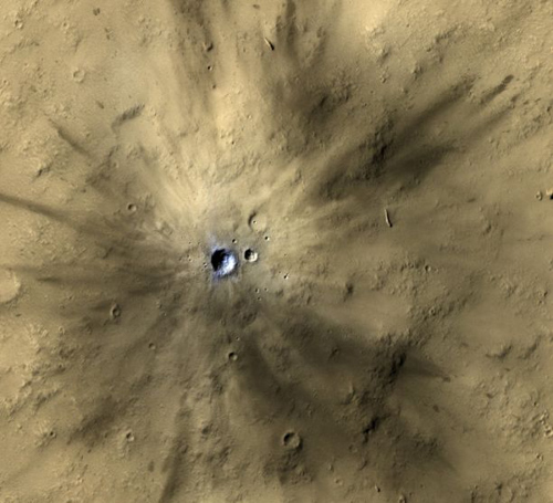 One of many fresh impact craters spotted by the UA-led HiRISE camera, orbiting the Red Planet on board NASA's Mars Reconnaissance Orbiter since 2006. (Photo by: NASA/JPL-Caltech/MSSS/UA)