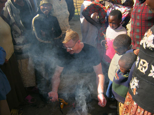 Jacobson demonstrates the VOTO charger in Kenya. (Kenya photos courtesy of Jacobson)