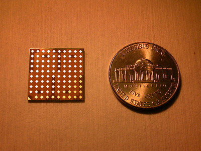 IBM research scientists create expandable 64 antenna array chip for low-frequency bandwidth spectrum. Packaged view of the intergrated circuit. The above photo depicts the size of the millimeter wave chip. Each of the 64 diamond shaped objects is an antenna. The spacing of these antennas is exact and allows for additional chips to be aligned next to the above one and expand the array. Image credit: IBM
