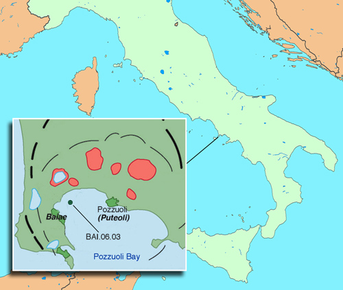 Pozzuoli Bay defines the northwestern region of the Bay of Naples. The concrete sample examined at the Advanced Light Source by Berkeley researchers, BAI.06.03, is from the harbor of Baiae, one of many ancient underwater sites in the region. Black lines indicate caldera rims, and red areas are volcanic craters. Image credit: Berkeley Lab