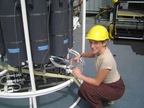 Karin Holmfeldt, the study’s first author, aboard a research vessel sampling viruses in the Atlantic Ocean. (Photo by: Marie Louise Kjaergaard Schroter)