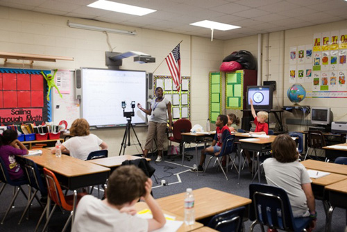 A teacher engages with students in a classroom. Image credit: U-M Measures of Effective Teaching Project.