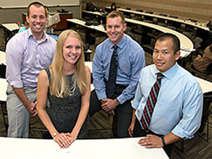 Military veterans and MBA students (l to r) Ernie Lietzan, Heidi Sandell, Robert Paulus, and Andrew Tsai are putting their skills and experience to work in the business world. Image credit: University of Minnesota