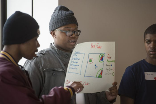 Students explain their data projects at the conclusion of the University of Chicago Computation Institute's High School Hackathon, held at the Searle Chemistry Laboratory on campus. Photo by Robert Kozloff