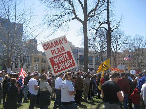 Sign from Madison, WI Tea Party. Sign Says "Obama's Plan White Slavery".  Author: cometstarmoon (Image source: Wikipedia)