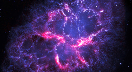 In blue, visible light from the Crab Nebulam seen by the Hubble Space Telescope. This comes from emissions of gases in the nebula, which are energised by the neutron star at the centre. In red, far infrared light seen by the Herschel Space Observatory. This comes mainly from cold dust and gas. Image credit: Hubble: NASA, ESA, Alison Loll & Jeff Hester (University of Arizona) & Herschel Space Observatory