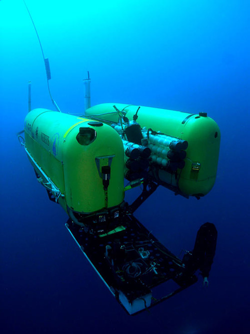 HROV Nereus from the water during its second expedition in 2009 to investigate hydrothermal vents along Earth’s deepest mid-ocean ridge in the Cayman Trough. On May 31, 2009, the robotic vehicle successfully reached the deepest part of the world’s ocean—the Challenger Deep in the Mariana Trench in the western Pacific Ocean.  The one-of-a-kind vehicle can operate either as an autonomous, free-swimming robot for wide-area surveys, or as a tethered vehicle for close-up investigation and sampling of seafloor rocks and organisms. (Photo courtesy Advanced Imaging and Visualization Laboratory, Woods Hole Oceanographic Institution)