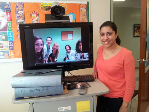 Fit for Healthy Weight telehealth station. UCLA's Kaizeen Mody (standing) with (onscreen, left to right) Nilufar Izadpanah, Masako Horino, Danyale McCurdy, Wendy Slusser and Dena Herman at UCLA's Fit for Healthy Weight telehealth station. Image credit: University of California