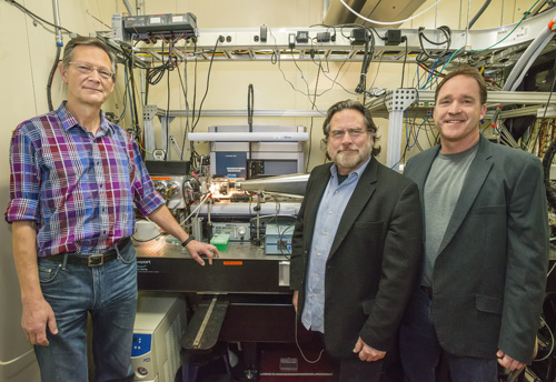 From left, Christer Jansson, John Tainer, and Steve Yannone at the SYBILS beamline at Berkeley Lab's Advanced Light Source. They're among a team of scientists working to make liquid transportation fuel from methane. Image credit: Berkeley Lab