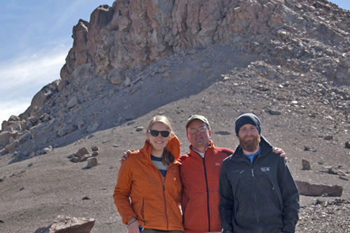 Michael O'Neal (center), associate professor of geological sciences, with graduate students Erika Schreiber and Renato Kane. Photo courtesy of Michael O’Neal