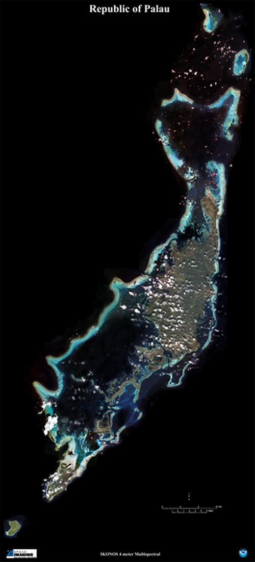 Satellite image of the main islands of the Republic of Palau, in the western Pacific Ocean. The light blue coloring is a barrier reef that surrounds the islands. Within the reef's lagoon, there are many small islands fringed by reefs as well as patches of corals on the seafloor. (Photo courtesy of NOAA)