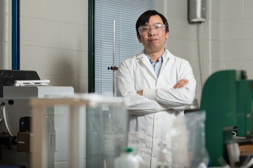 A UD engineering research team led by Feng Jiao has developed a highly selective catalyst capable of electrochemically converting carbon dioxide to carbon monoxide with 92 percent efficiency. Photo by Evan Krape and illustration courtesy of Feng Jiao