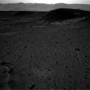 This image from the Navigation Camera (Navcam) on NASA's Curiosity Mars rover includes a bright spot near the upper left corner. Image credit: NASA/JPL-Caltech (Click image to enlage)