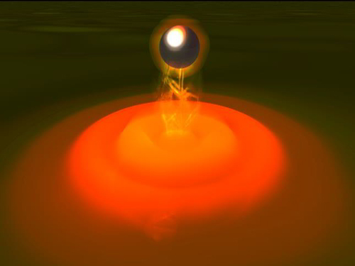 Ein Atom koppelt an ein Oberflächen-Plasmon. Image credit: Künstlerische Darstellung: Sebastian Slama