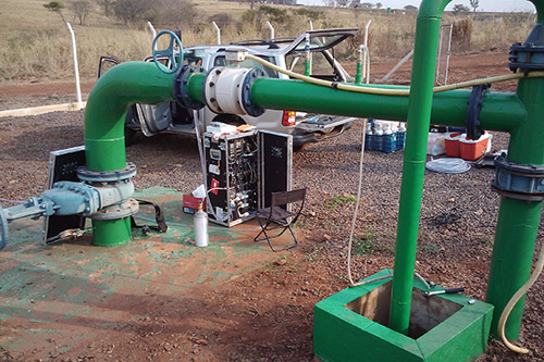 A groundbreaking Nature Geoscience article co-authored by UD geochemist Neil Sturchio describes a new method to accurately date groundwater. Pictured at a well in Brazil is machinery used for the extraction of dissolved gases from groundwater. The apparatus extracts the gases as the water flows through and compresses them into a small aluminum cylinder. Photos by Neil Sturchio and Ambre Alexander Payne