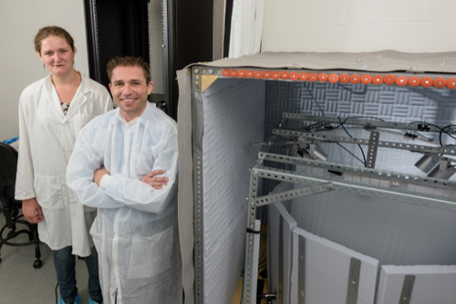 Brain science researcher Joshua Neunuebel (right) and graduate student Megan Warren in the laboratory where they are studying mouse "songs." Photo by Evan Krape