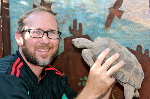 UA geneticist Taylor Edwards comes nose to nose with the recently discovered Goode's Thornscrub Tortoise. (Photo courtesy of Taylor Edwards)
