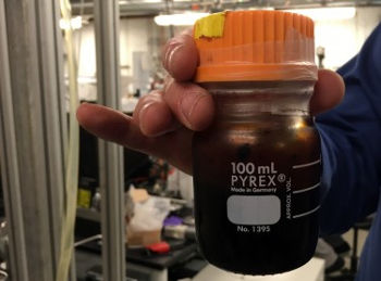 A container of bio oil, produced by the UW research team. Image credit: University of Washington 