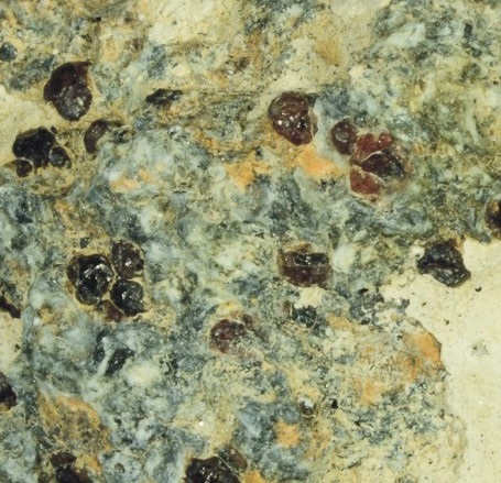 The fragment of the metamorphic rock eclogite in which the garnet that encased the ferric-iron-rich majorite sample was found in Northern China. Image is courtesy of Yingwei Fei. 